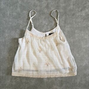 American Eagle cream embroidered baby doll tank top
